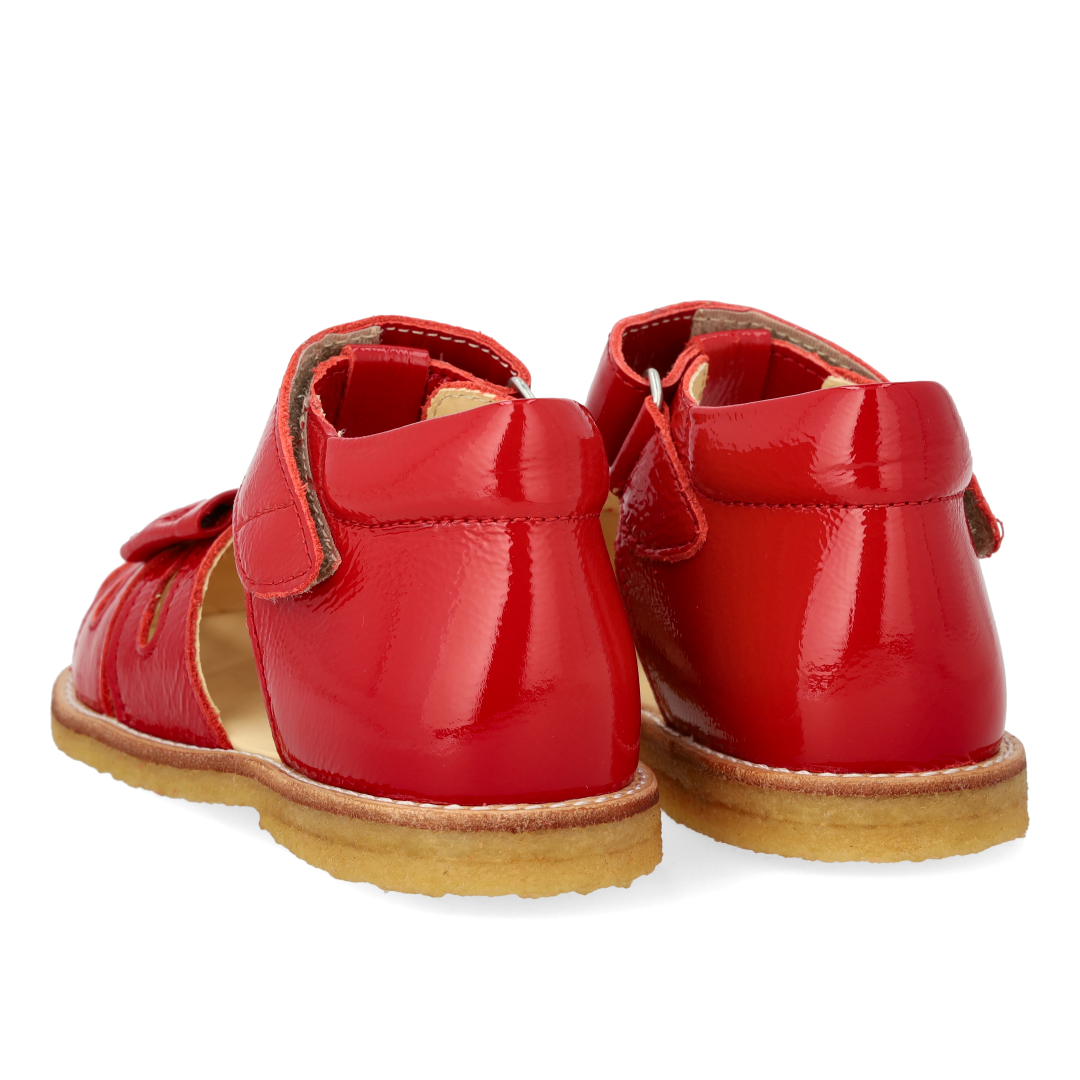Toddler sandal with bow and velcro closure
