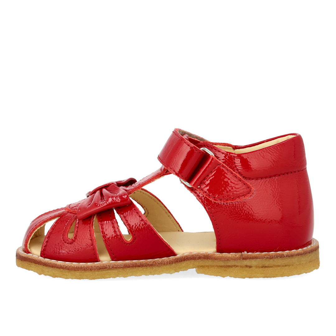 Toddler sandal with bow and velcro closure