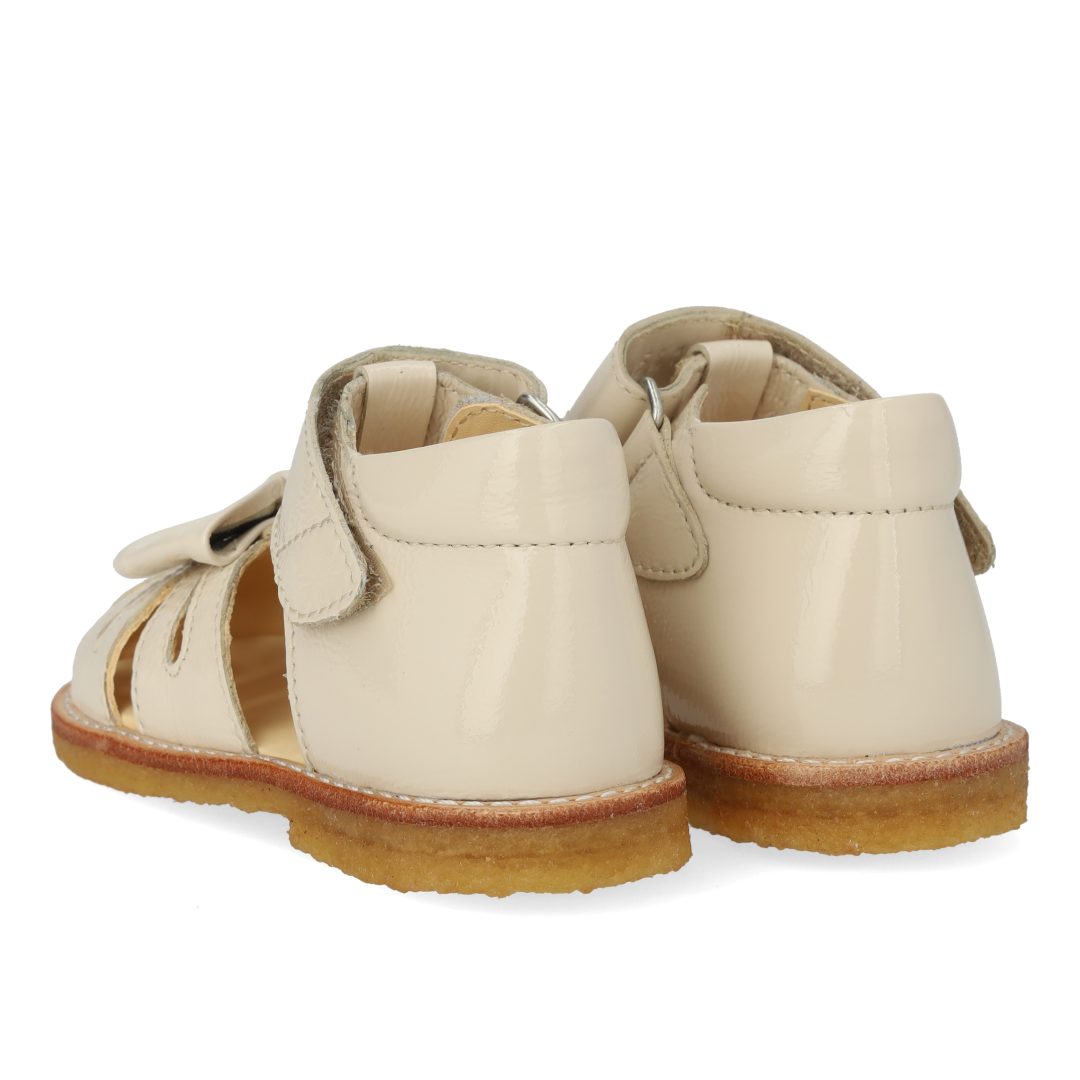 Toddler sandal with bow and velcro closure