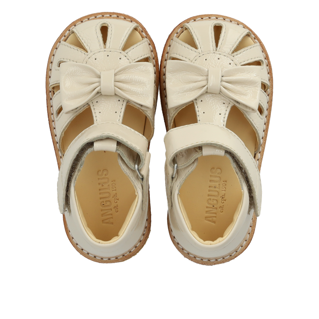 Toddler sandal with bow and velcro closure
