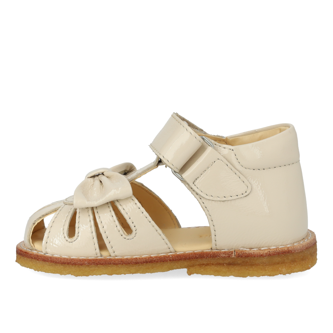 Toddler sandal with bow and velcro closure