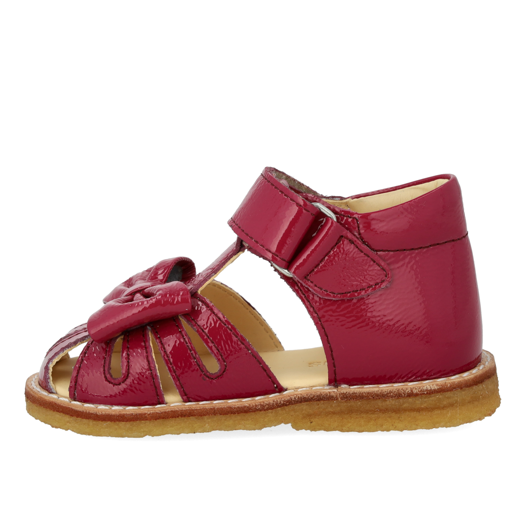 Toddler sandal with bow and velcro closure