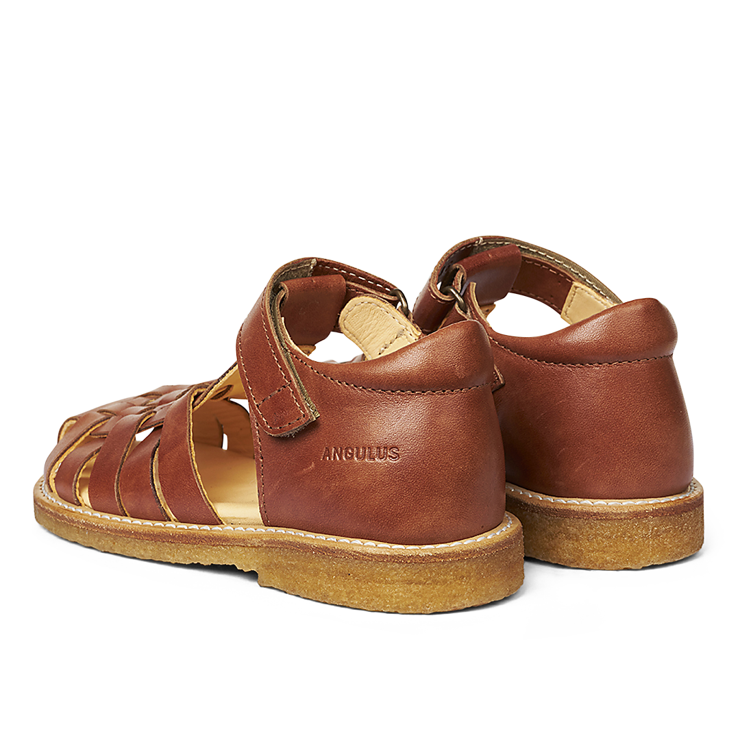 Braided sandal with adjustable Velcro closure