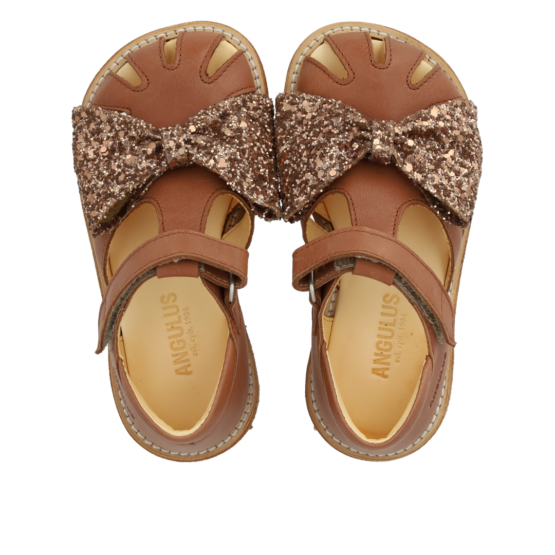 Sandal with glitter bow and velcro closure