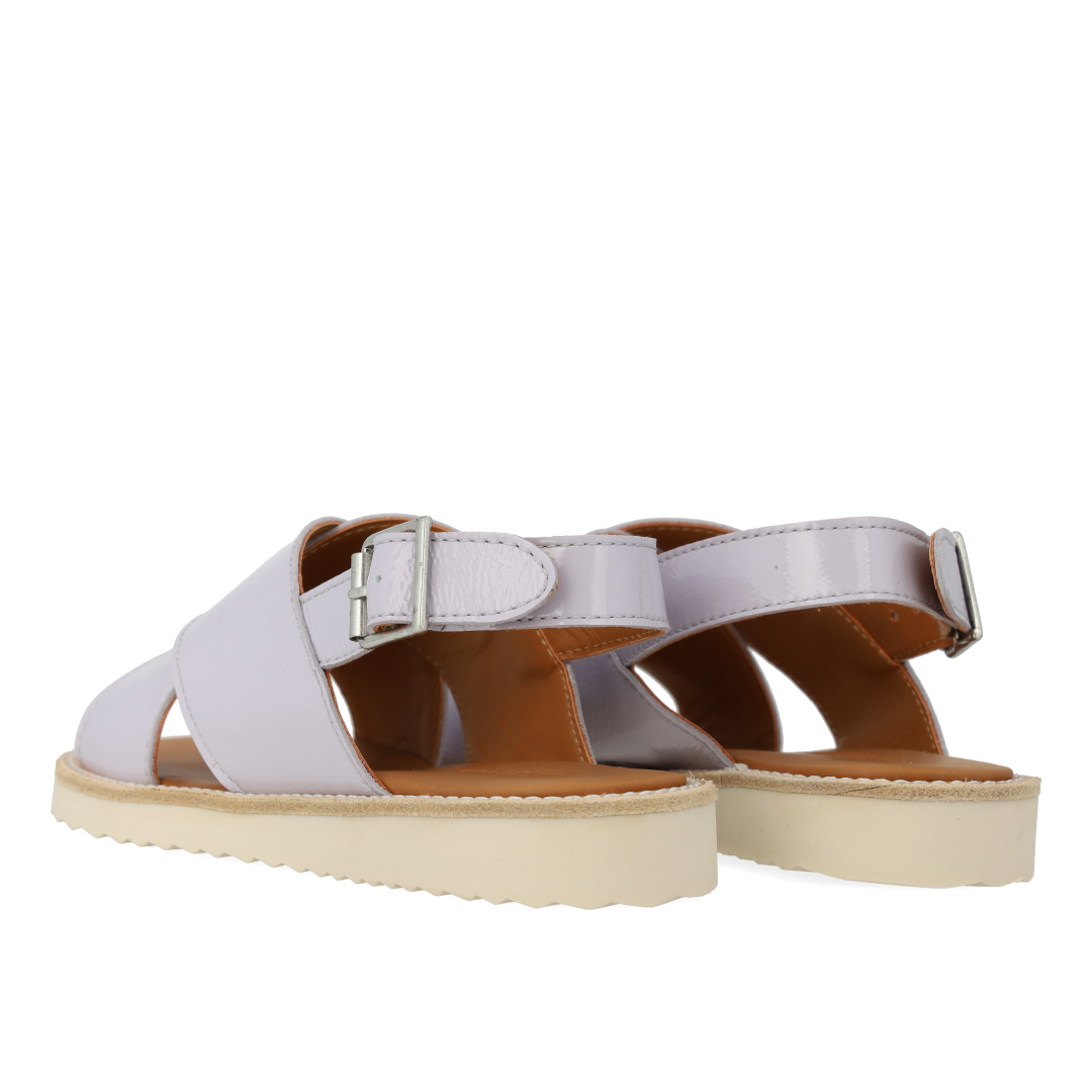 Cross-strap sandal with buckle fastening