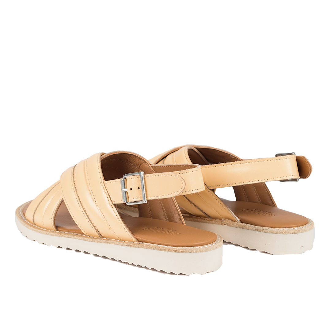 Padded cross sandal with buckle closure