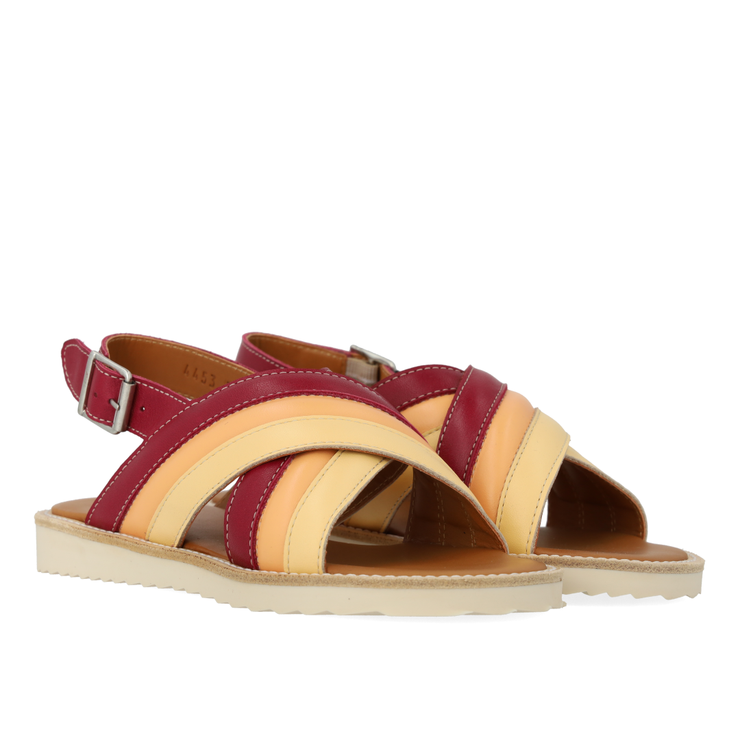 Padded cross-strap sandal with buckle closure
