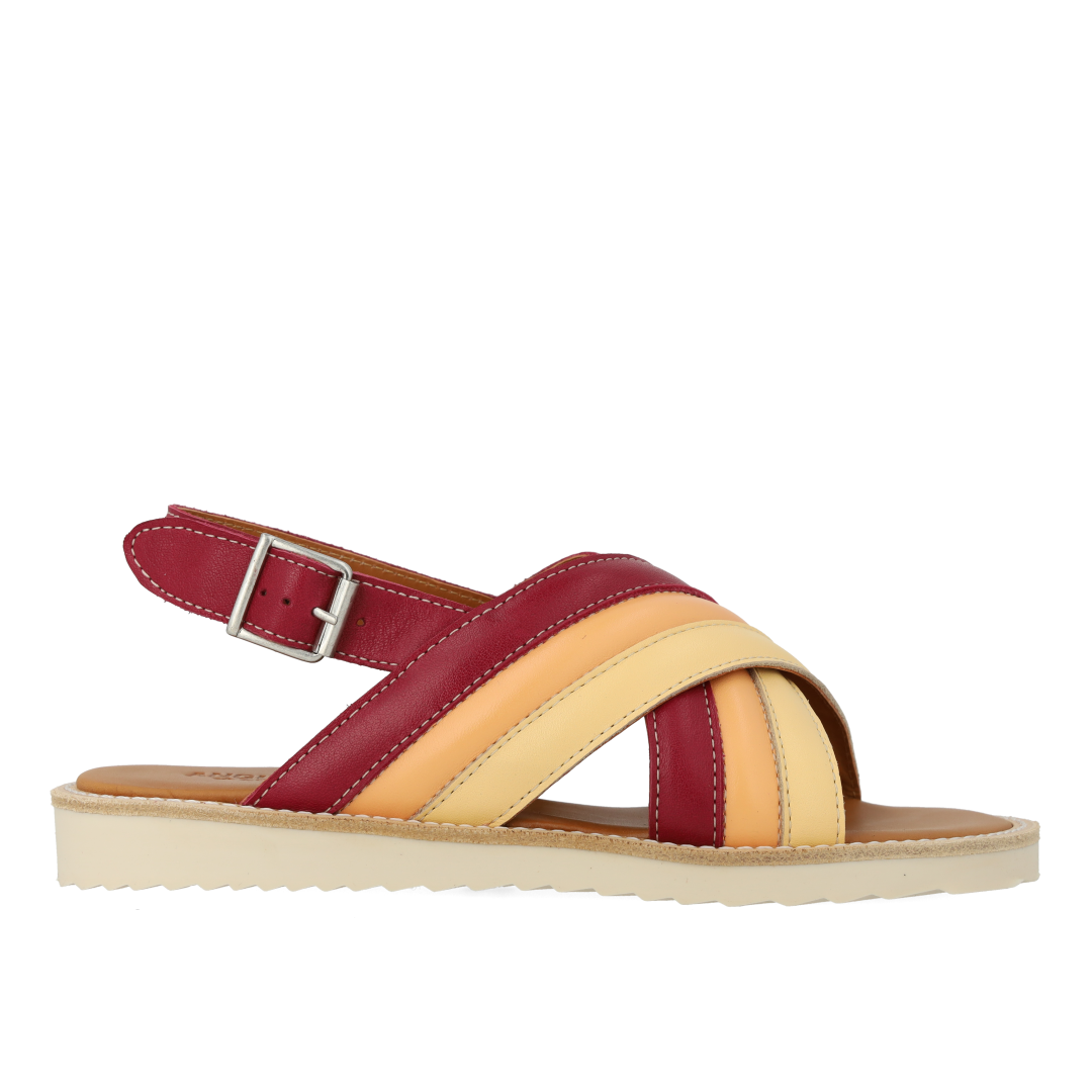Padded cross-strap sandal with buckle closure