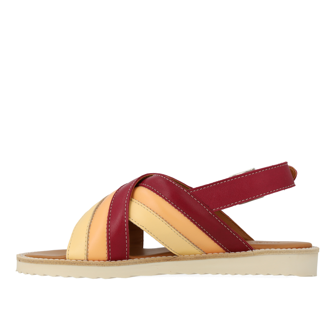 Padded cross-strap sandal with buckle closure