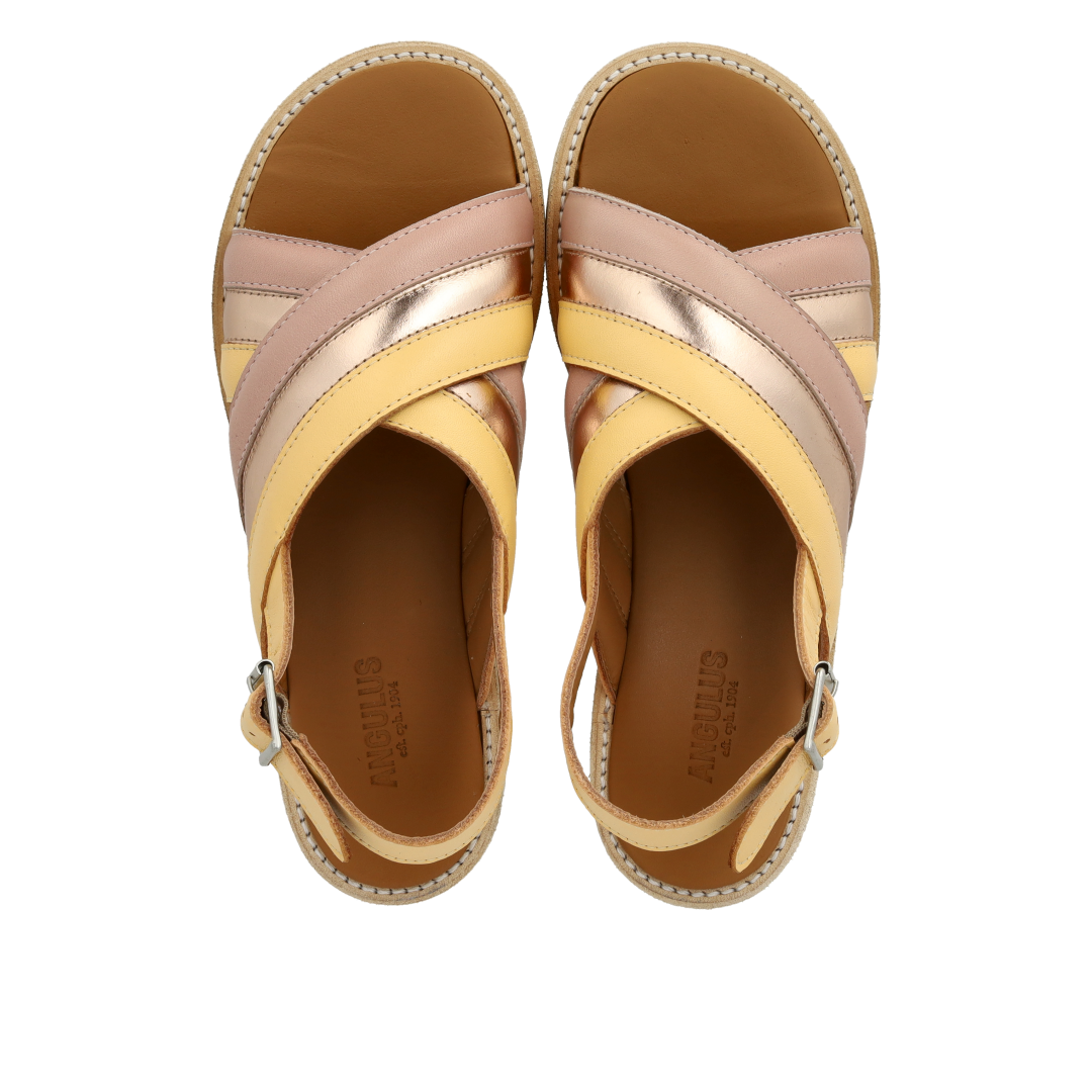 Padded cross-strap sandal with buckle closure
