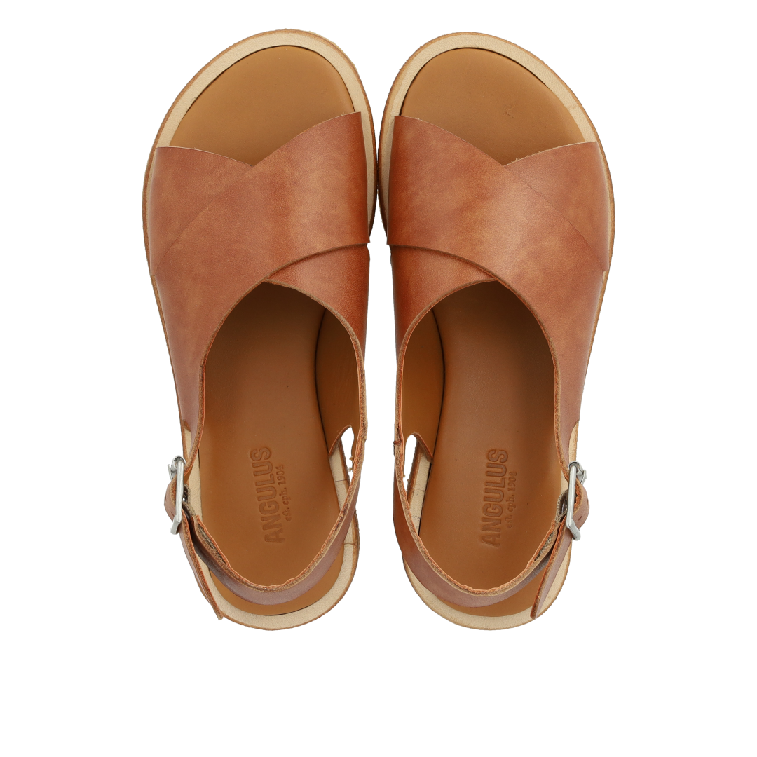 Cross sandal with buckle closure