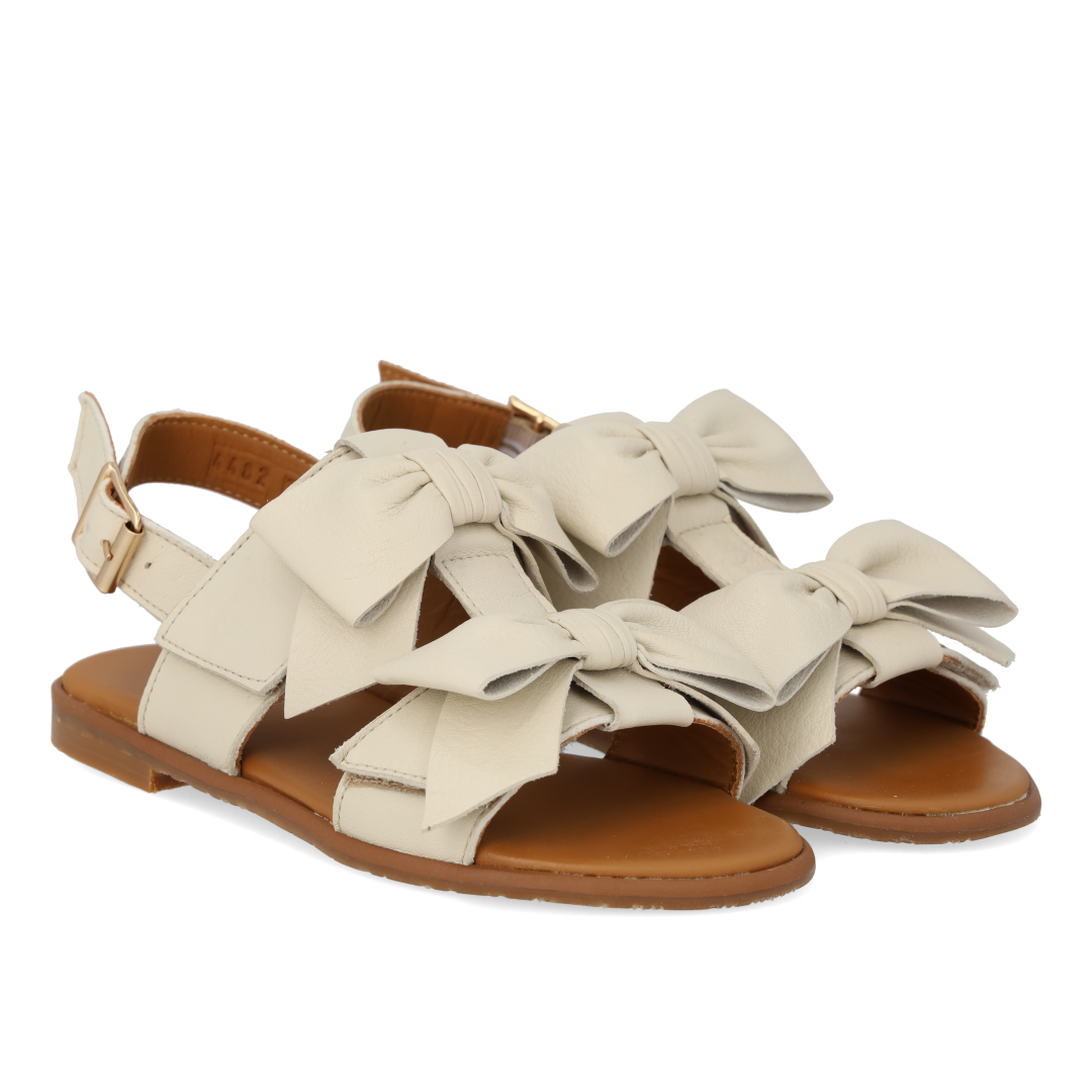 Sandal with bow, velcro and buckle