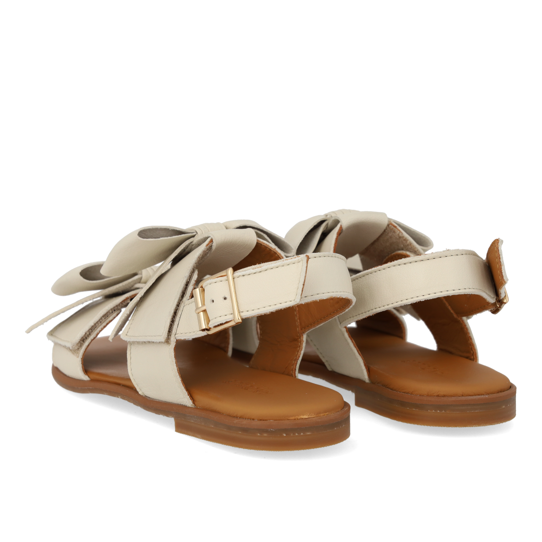 Sandal with bow, velcro and buckle