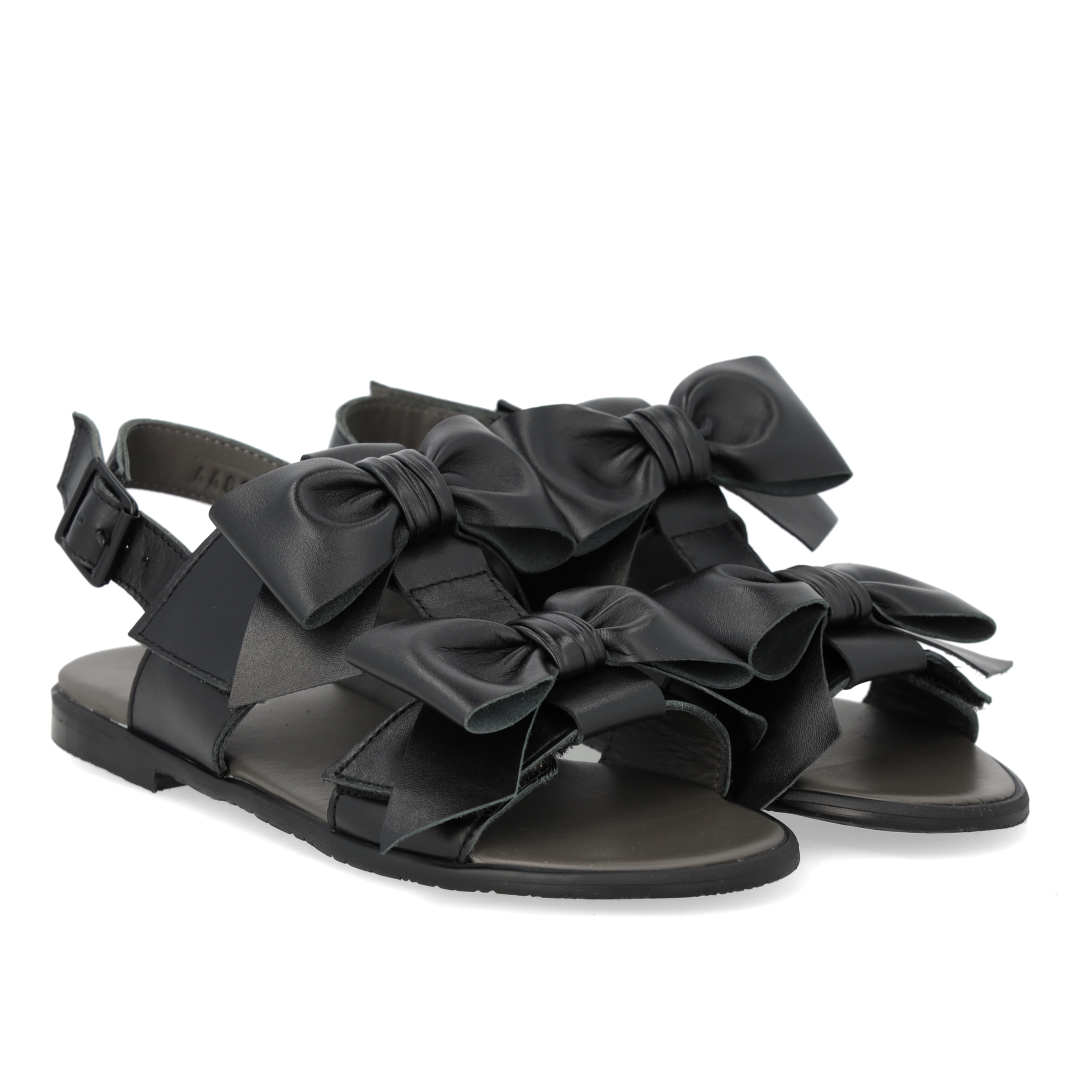 Sandal with bow, velcro and buckle