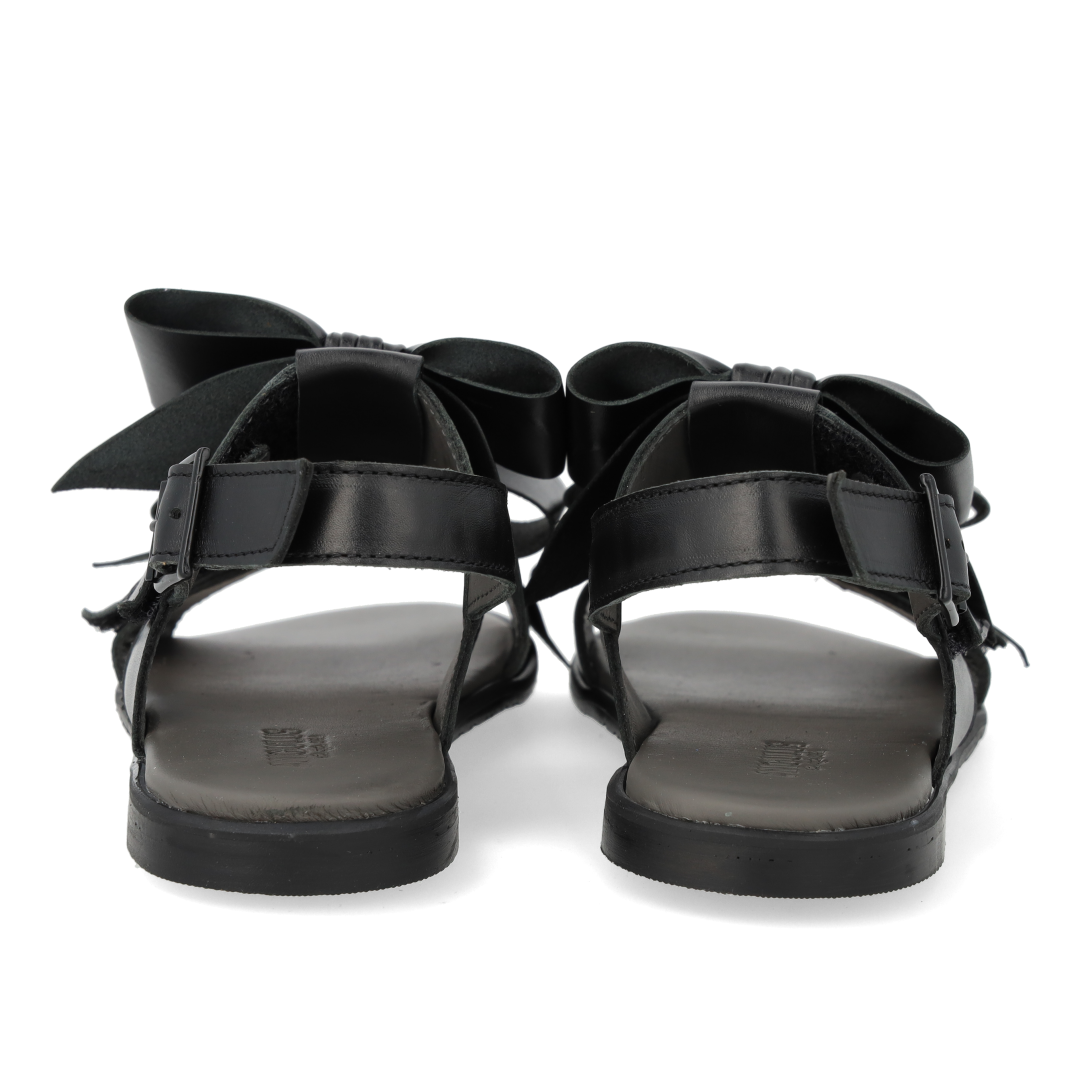 Sandal with bow, velcro and buckle