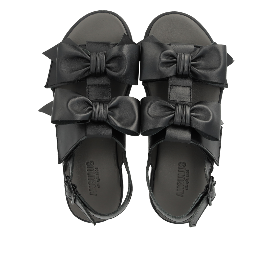 Sandal with bow, velcro and buckle