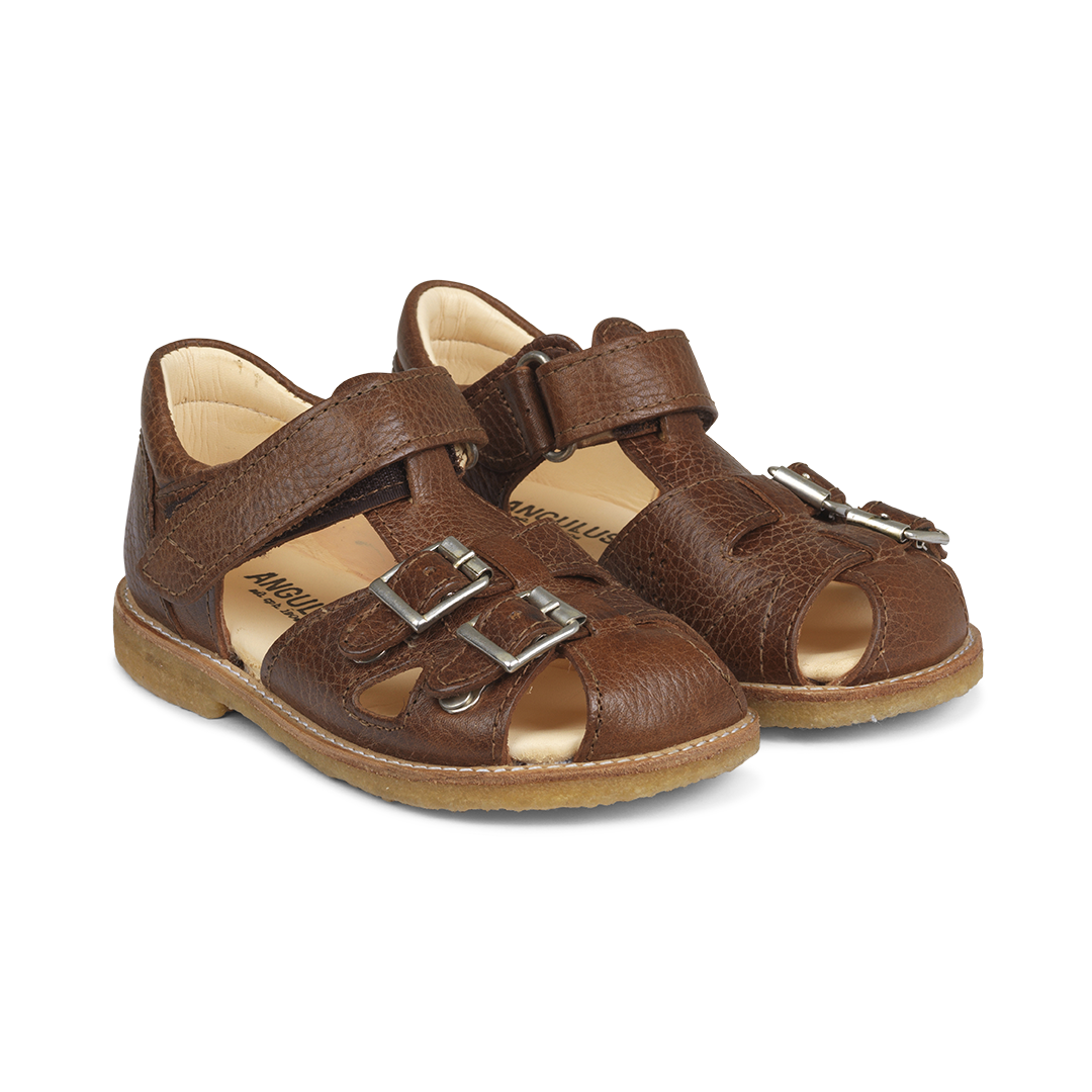 Sandal with adjustable velcro and buckles