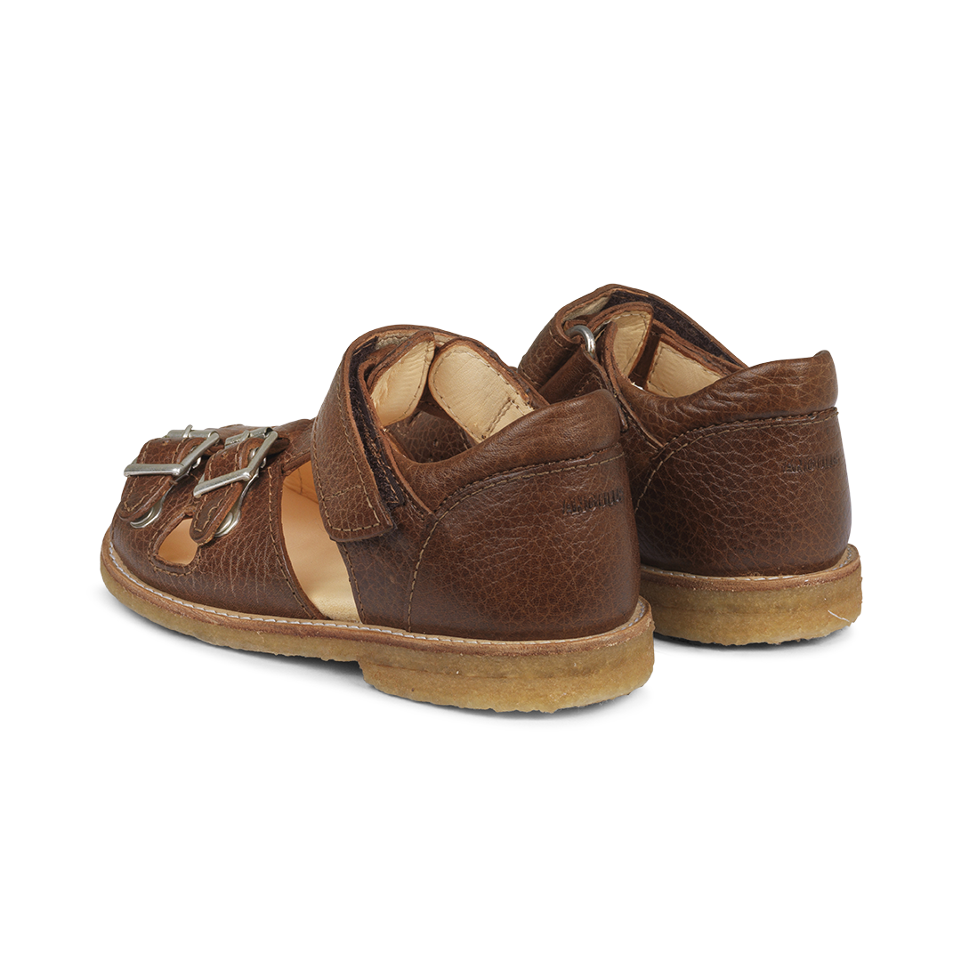 Sandal with adjustable velcro and buckles