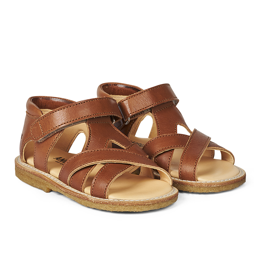 Criss-cross sandal with open toe and Velcro closure