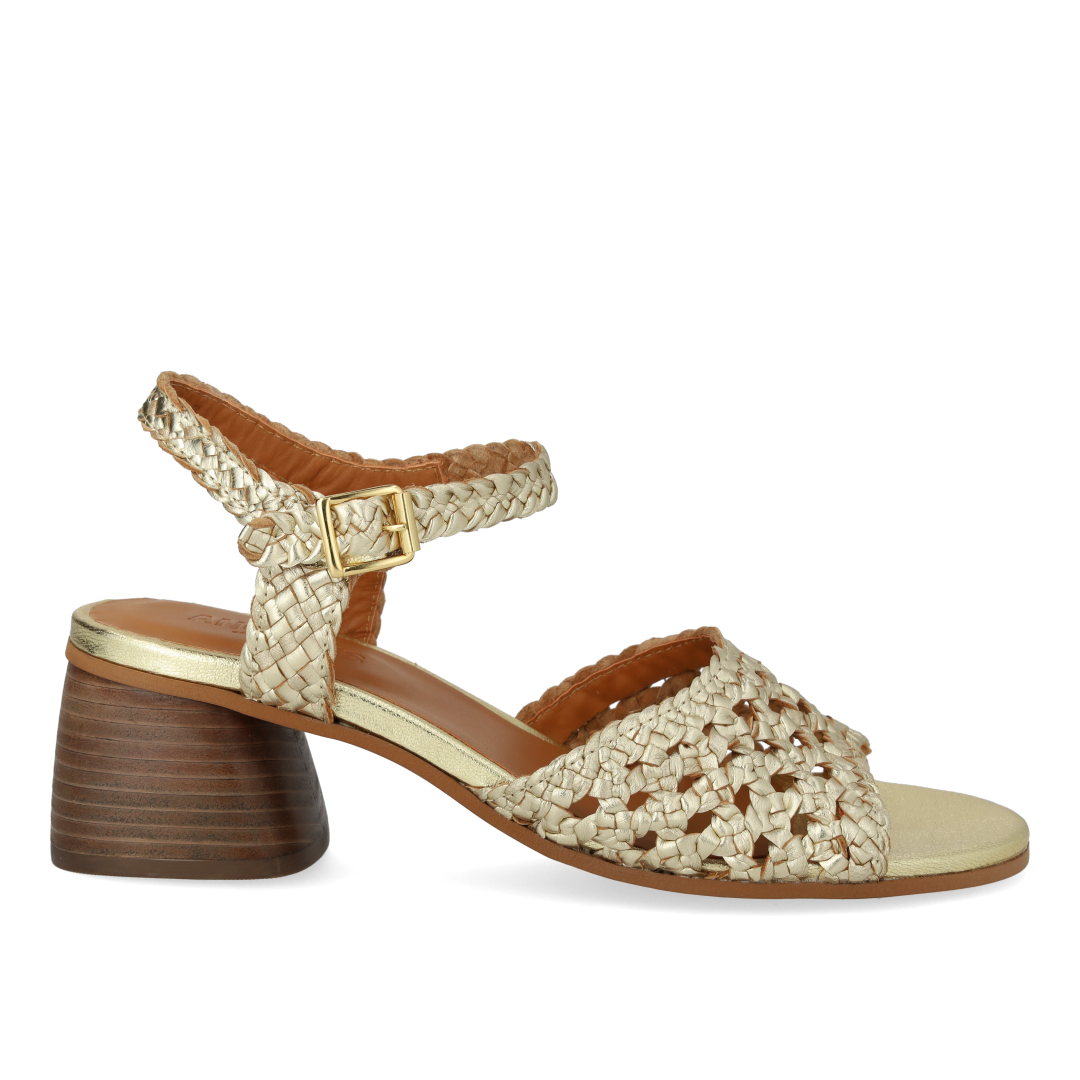 Hand-braided sandal with sculptural heel