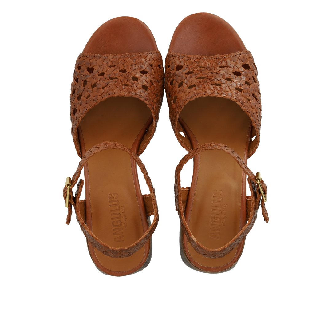 Hand-braided sandal with sculptural heel