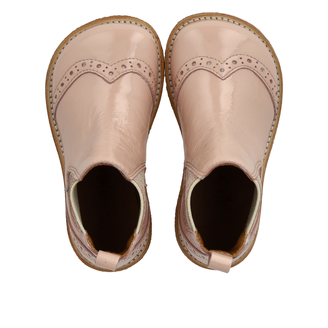 Chelsea boot with decorative brogue perforations