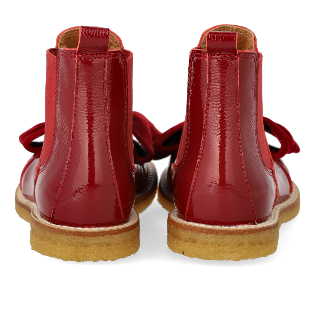 Chelsea boot with velour bow