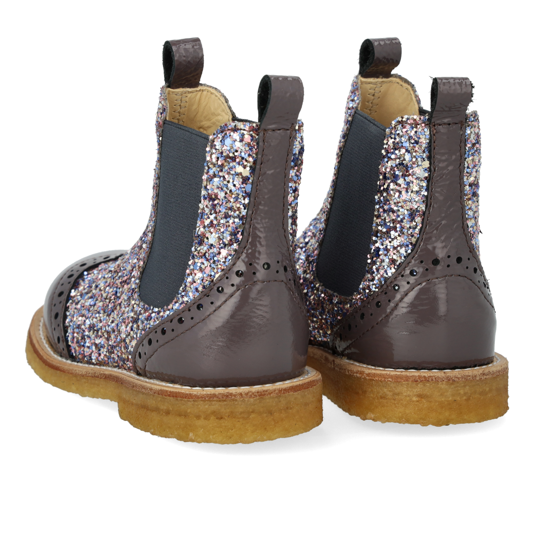 Chelsea boot with brogue perforations