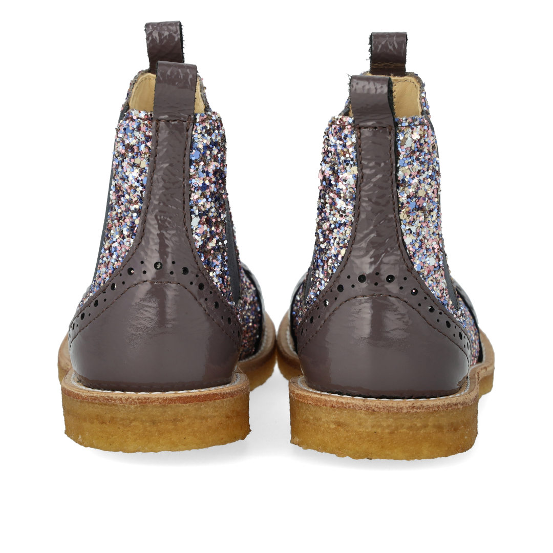Chelsea boot with brogue perforations