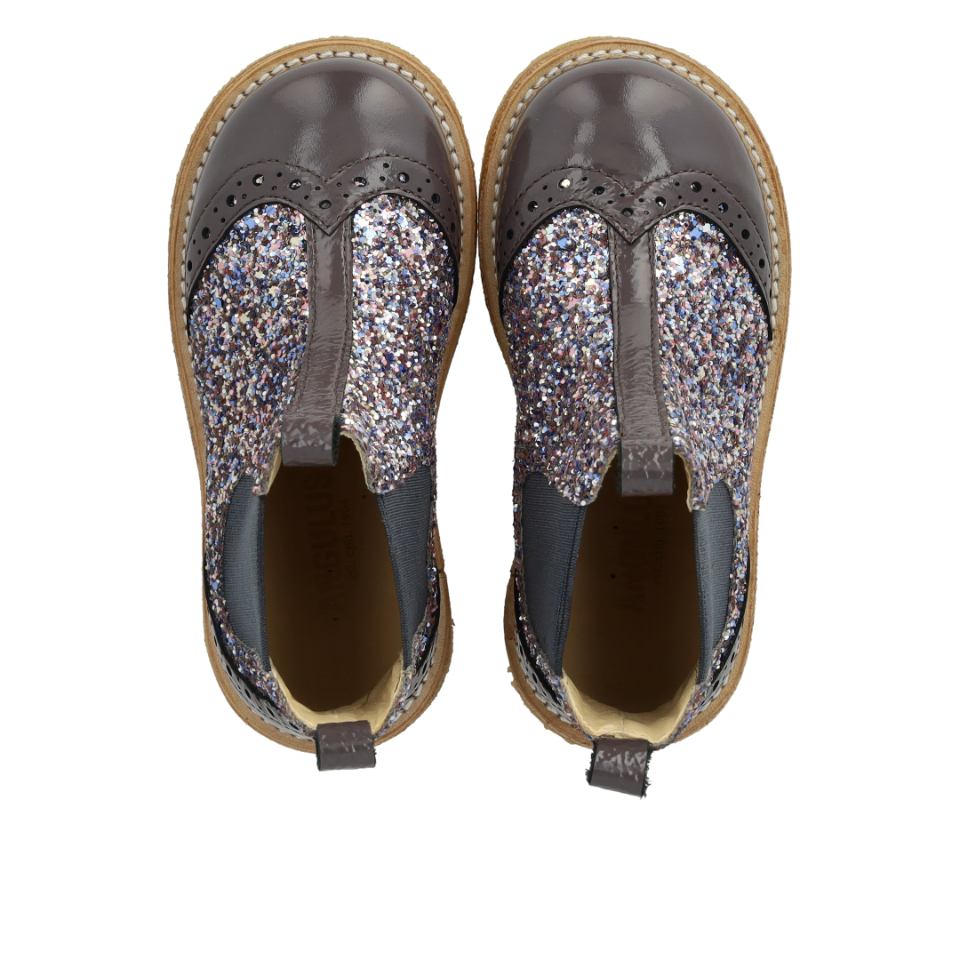 Chelsea boot with brogue perforations