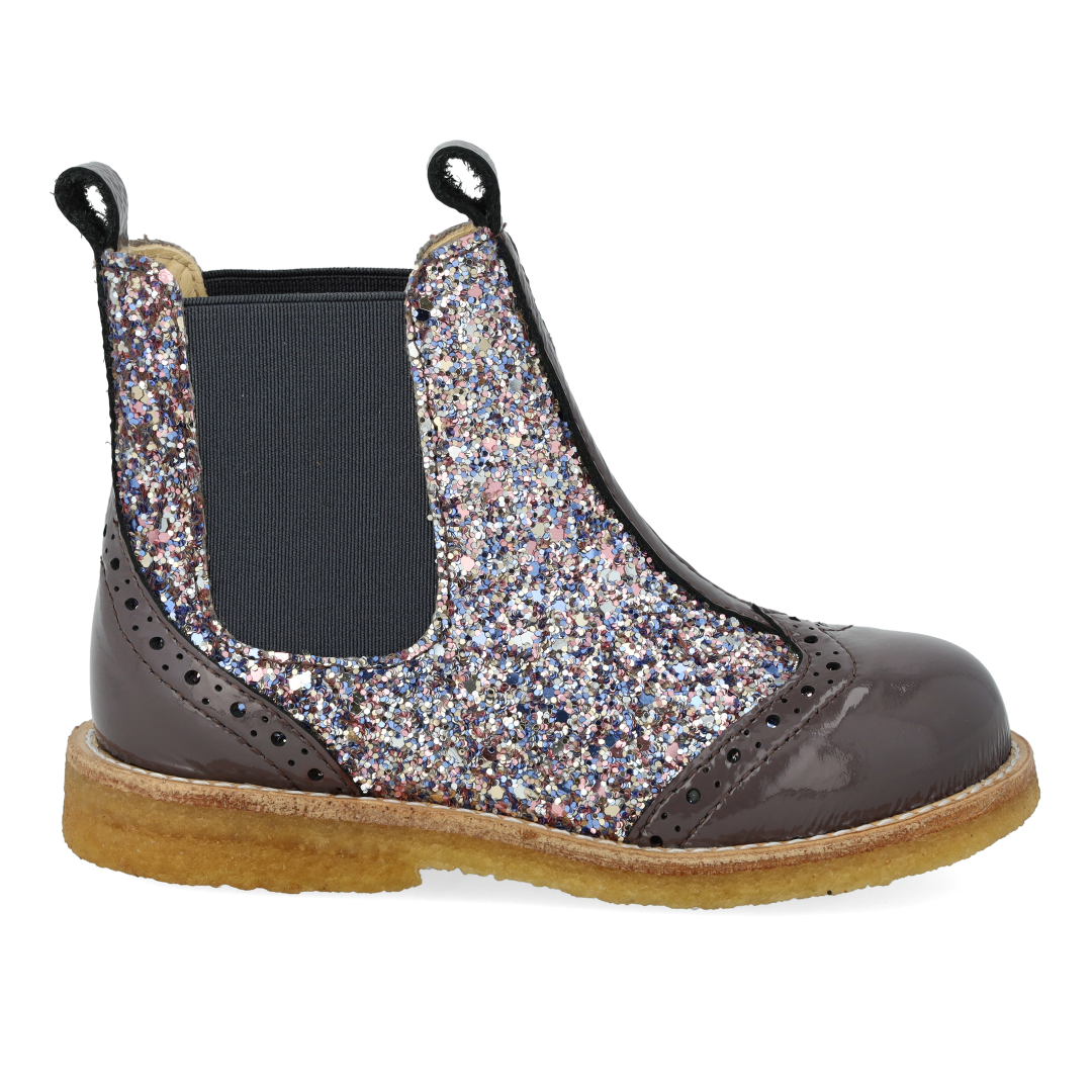 Chelsea boot with brogue perforations
