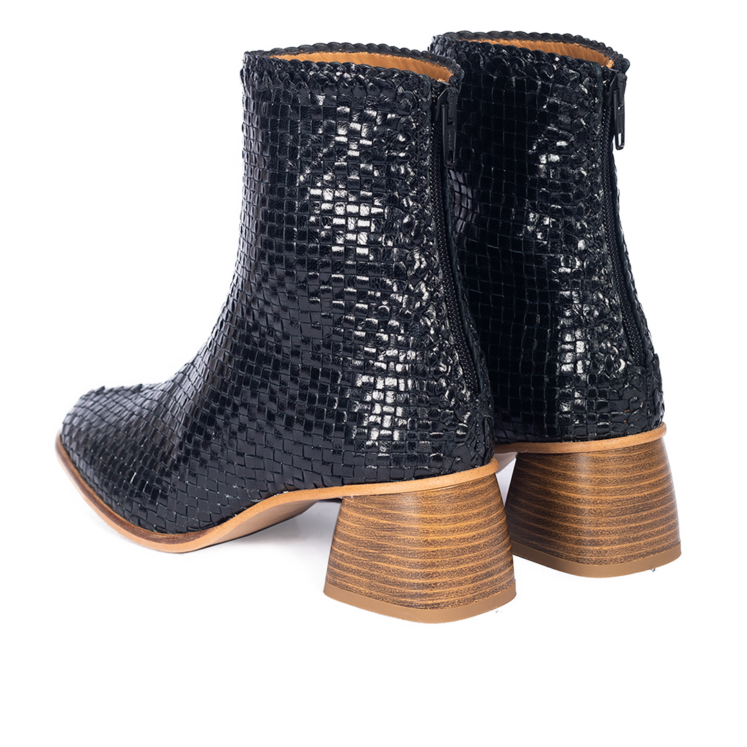 Hand-braided leather ankle boot with sculptural block heel