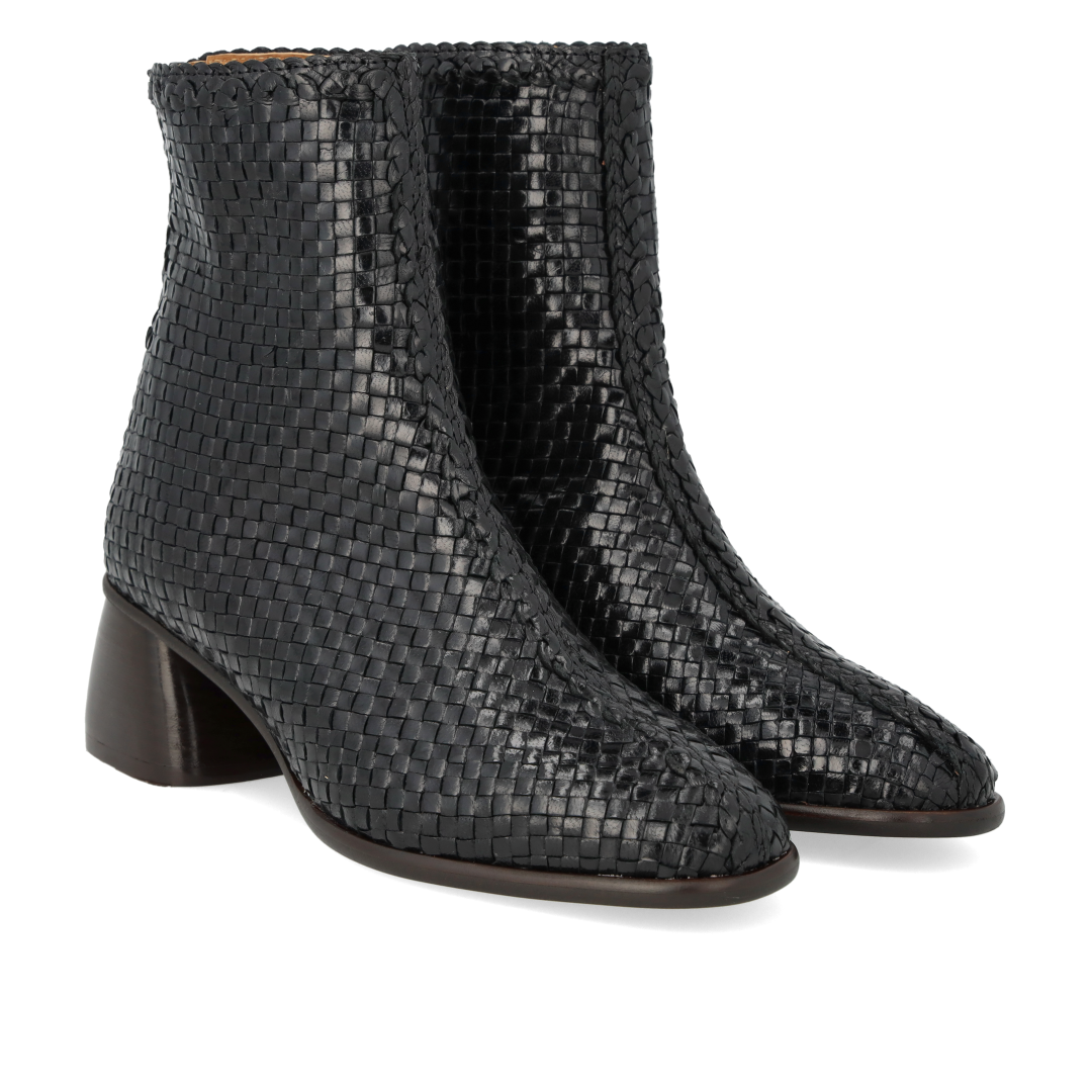Hand-braided leather boot with sculptural block heel