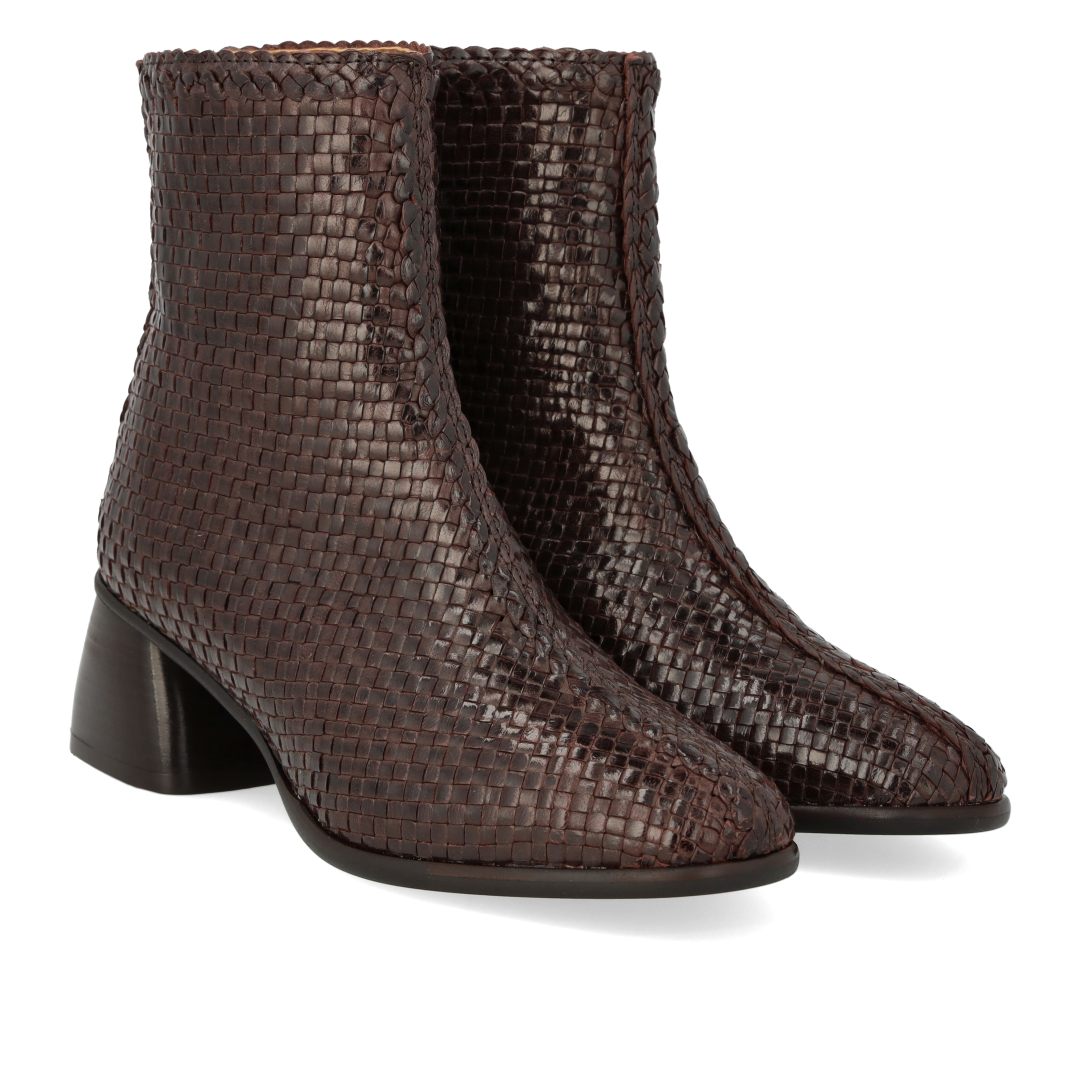 Hand-braided leather ankle boot with sculptural block heel