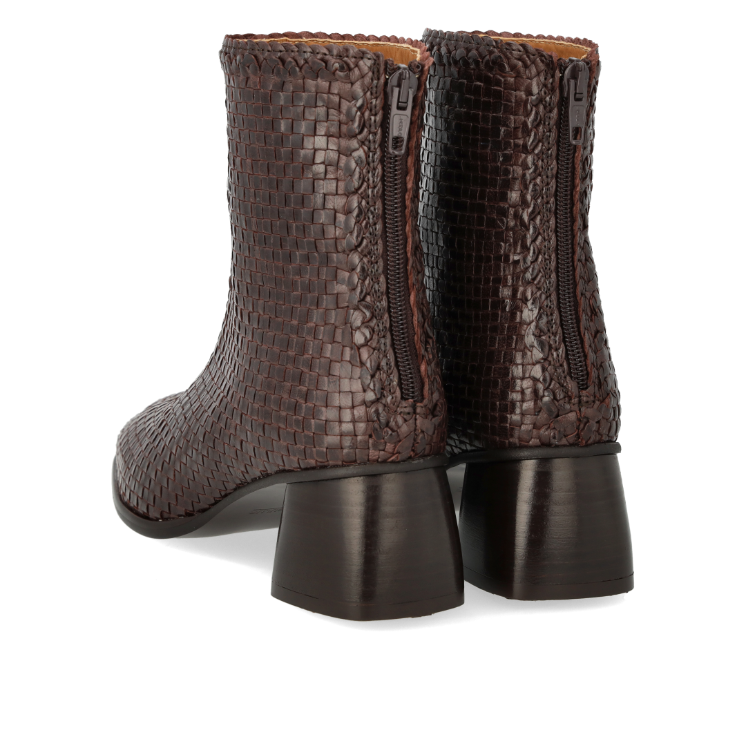 Hand-braided leather ankle boot with sculptural block heel