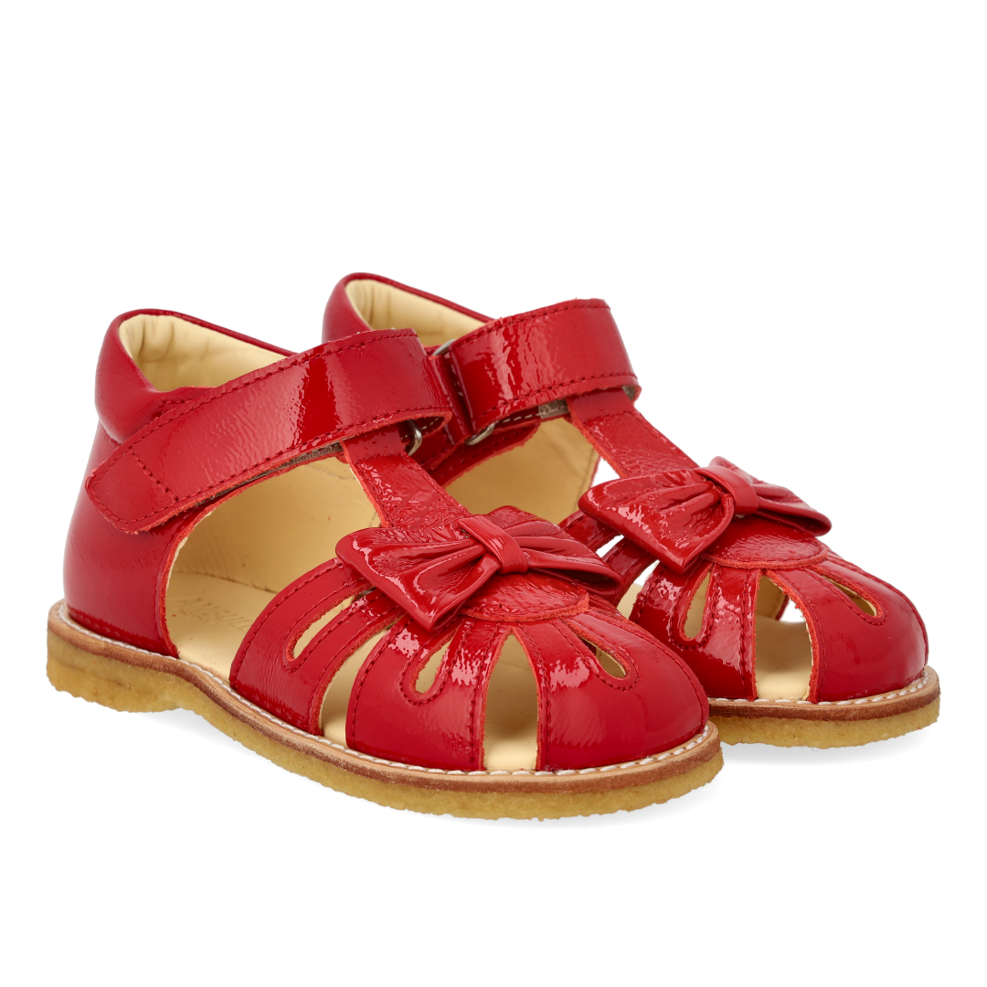 Toddler sandal with bow and velcro closure