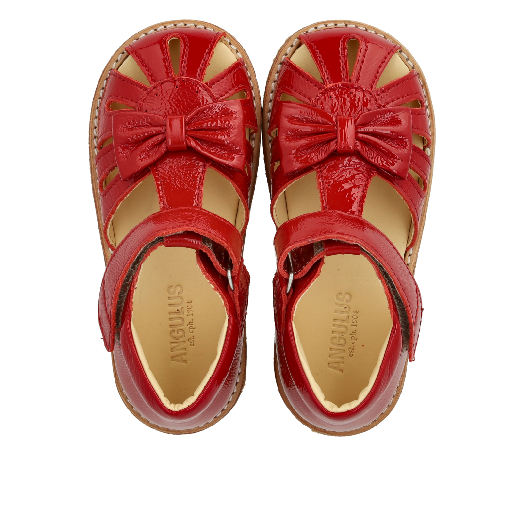 Toddler sandal with bow and velcro closure