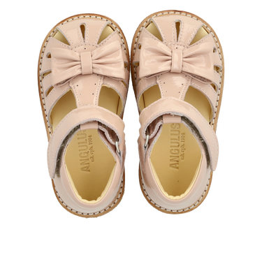 Starter sandal with a bow and velcro closure