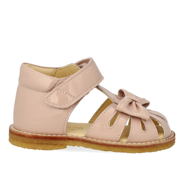 Starter sandal with a bow and velcro closure