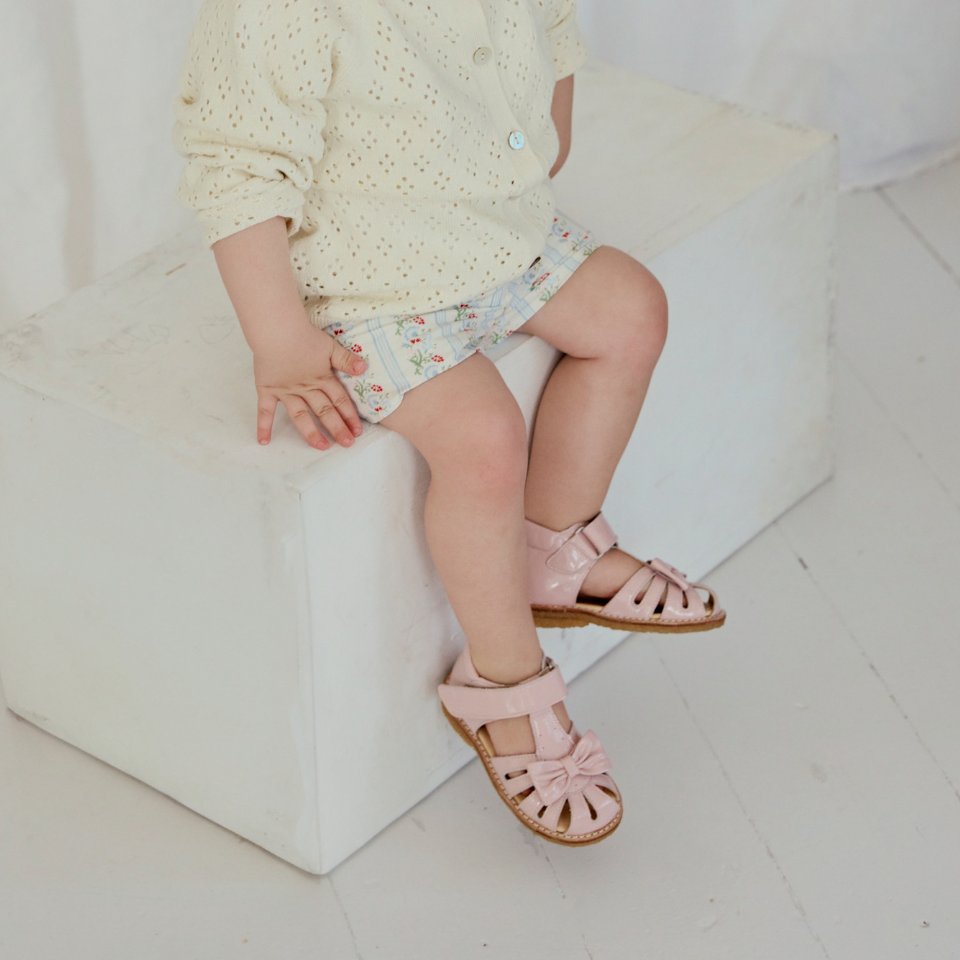 Toddler sandal with bow and velcro closure