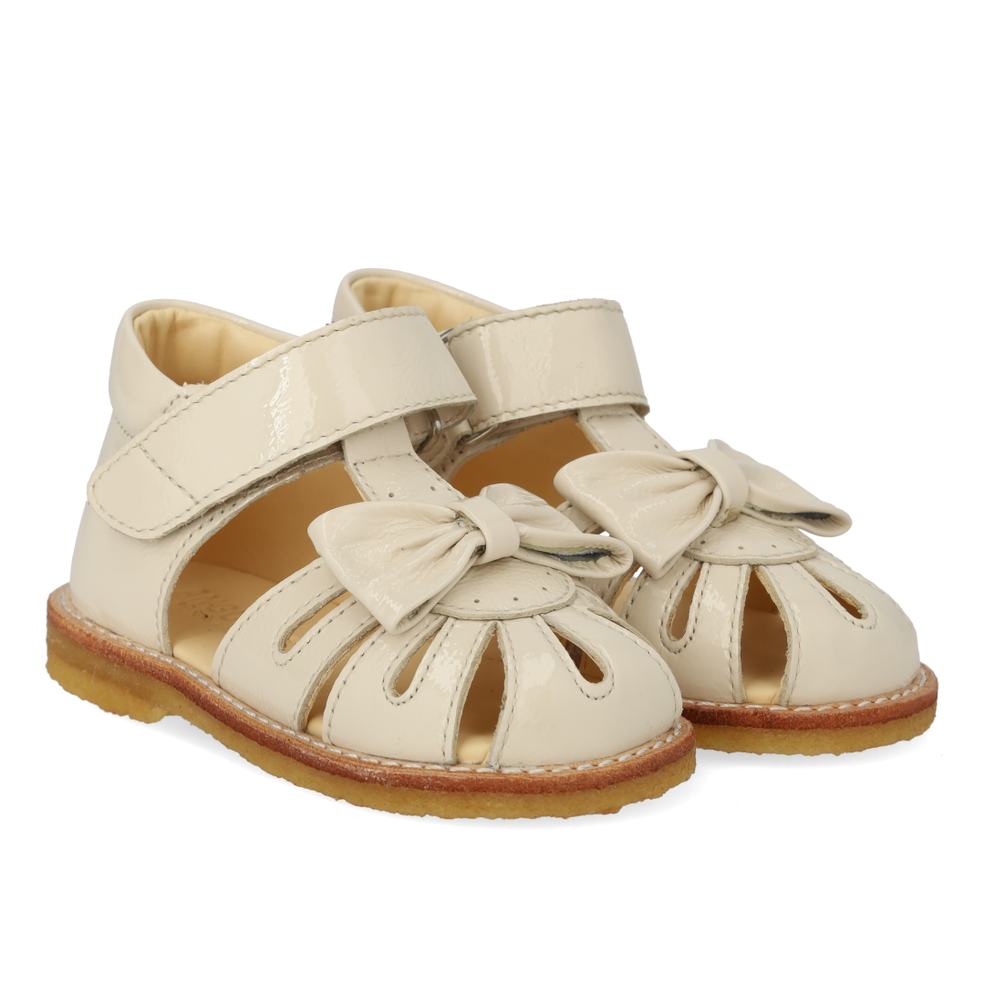 Toddler sandal with bow and velcro closure