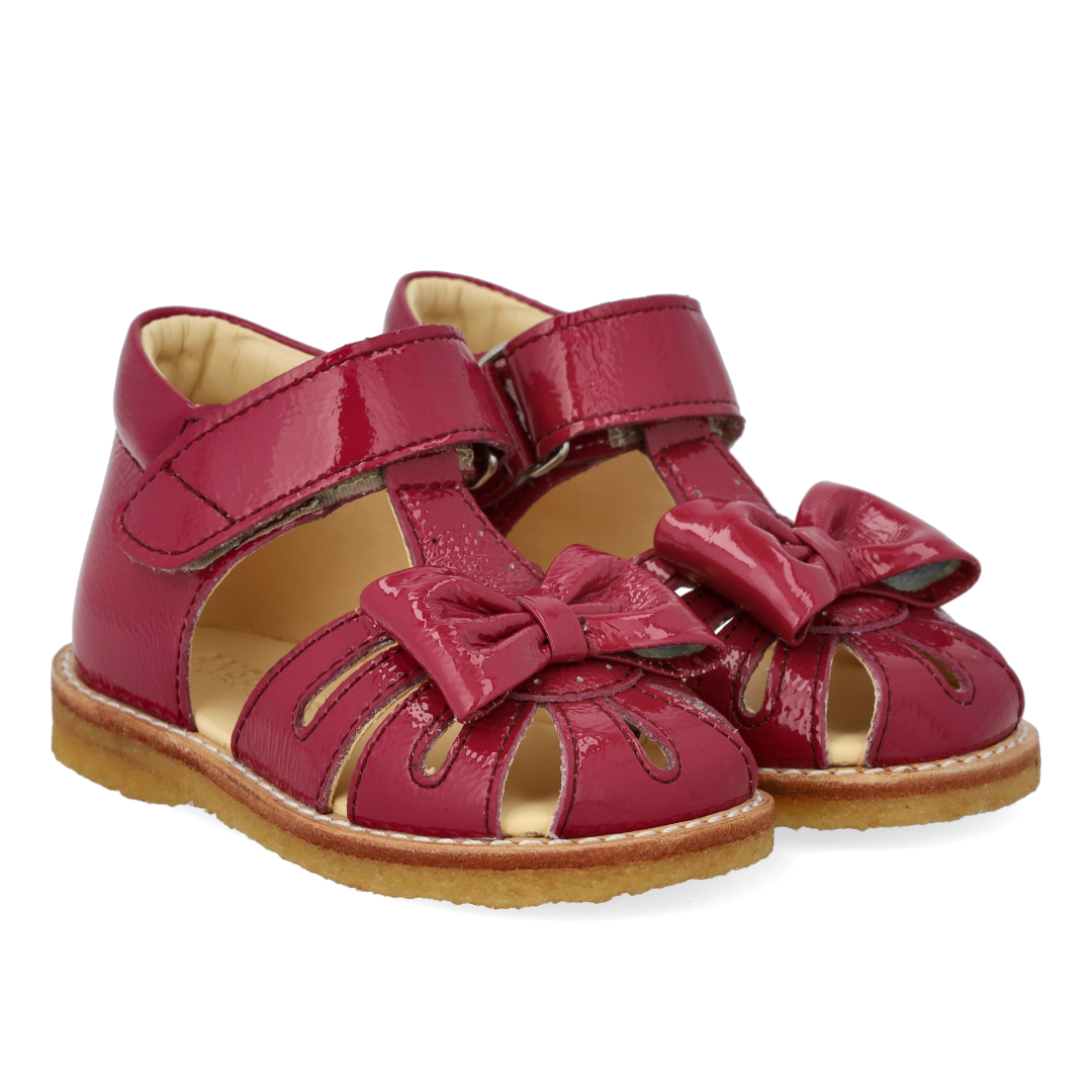 Toddler sandal with bow and velcro closure
