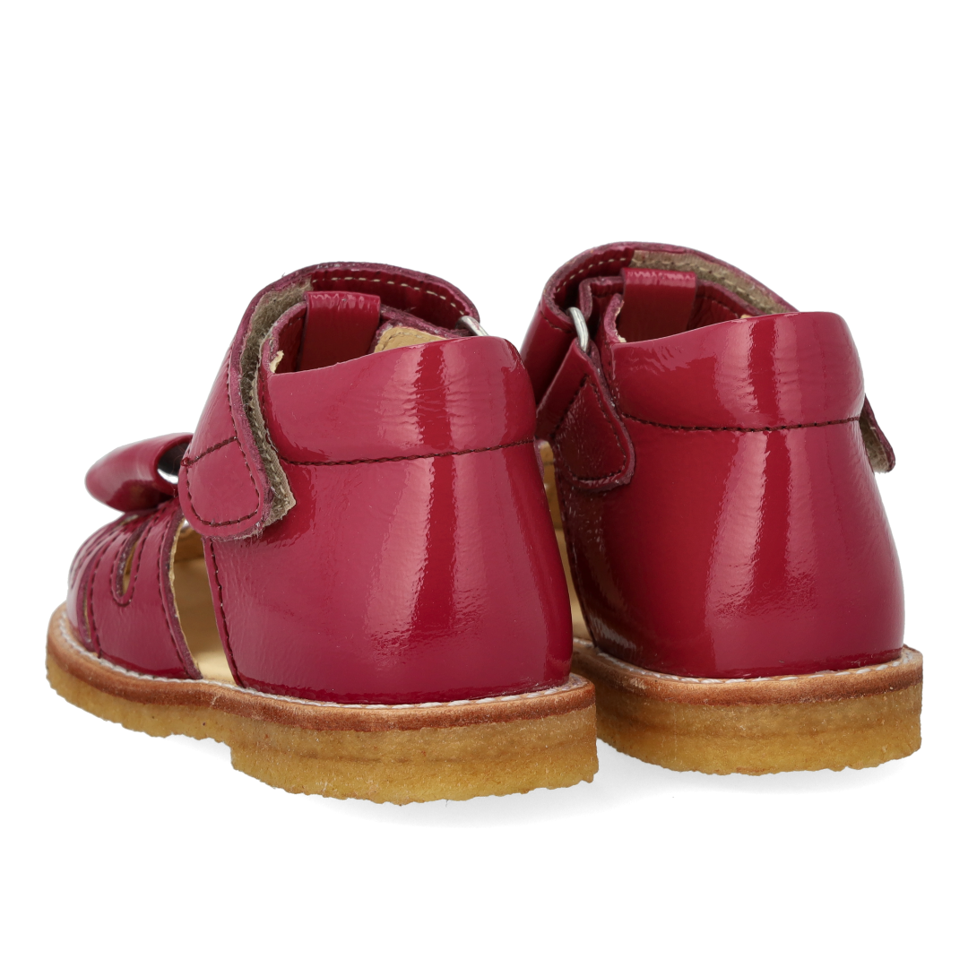 Toddler sandal with bow and velcro closure