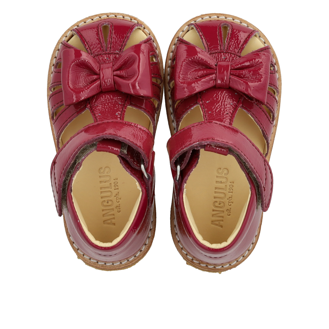 Toddler sandal with bow and velcro closure