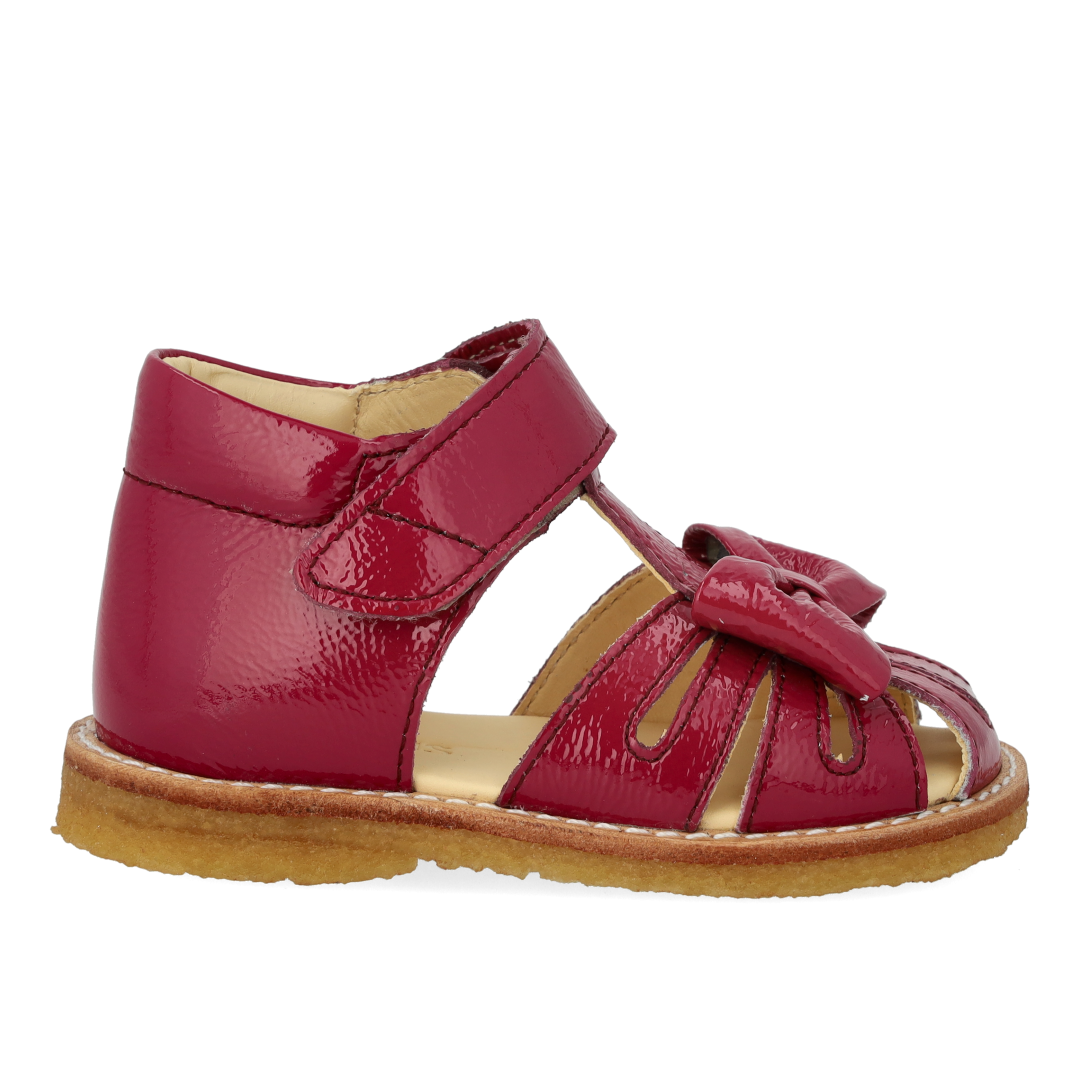 Toddler sandal with bow and velcro closure