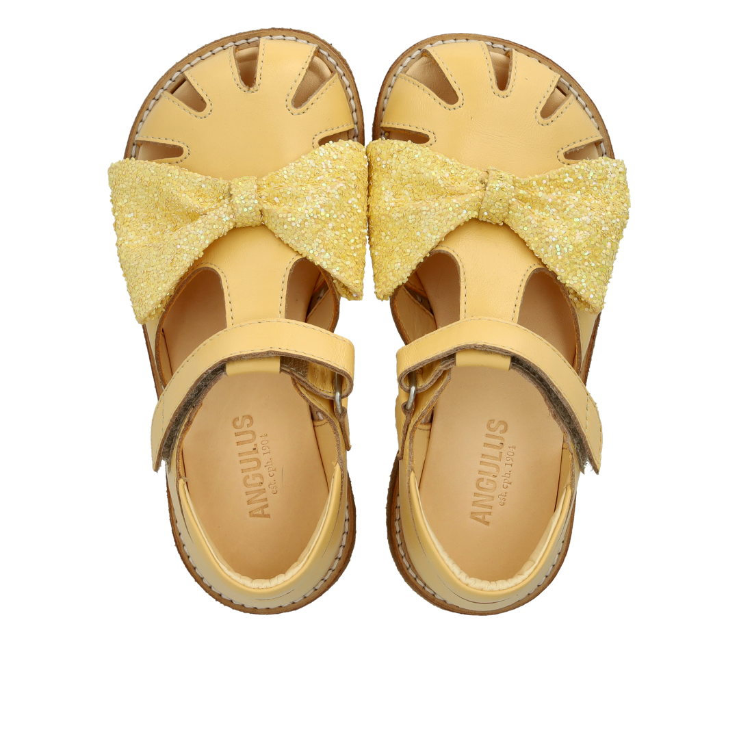 Sandal with glitter bow and Velcro closure