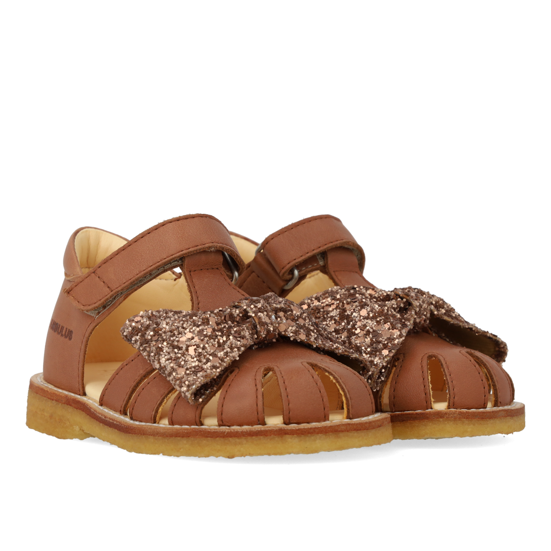 Toddler sandal with glitter bow and Velcro closure