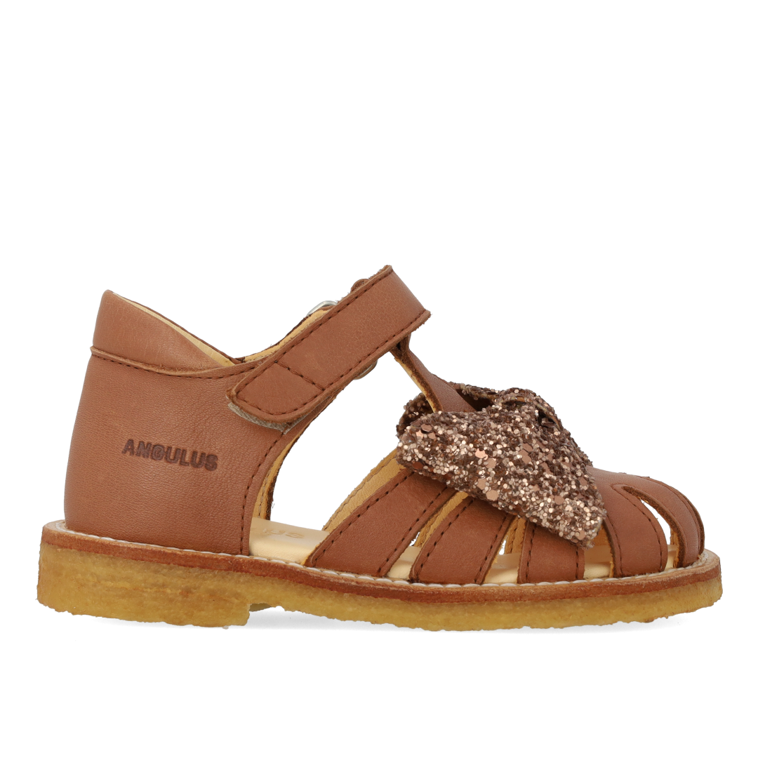 Toddler sandal with glitter bow and Velcro closure