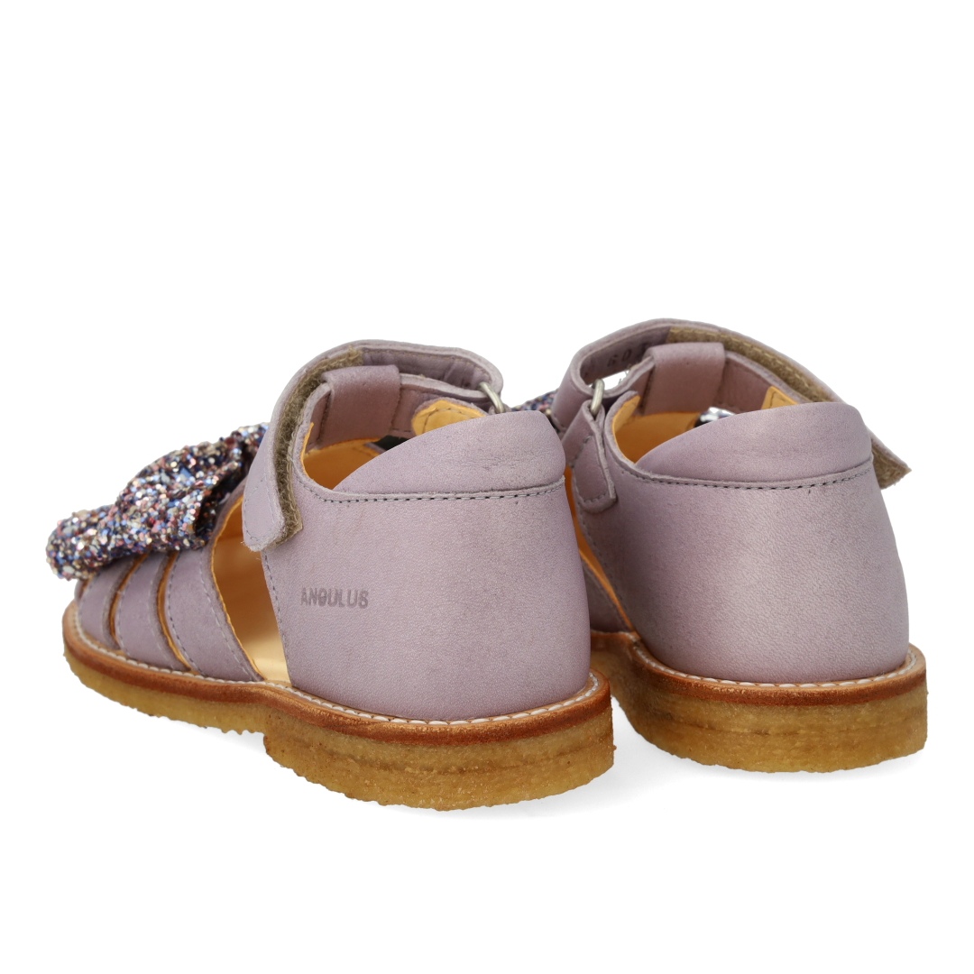 Toddler sandal with glitter bow and Velcro closure