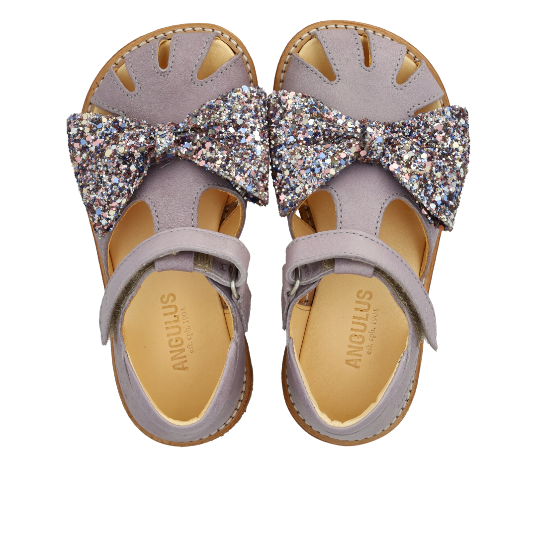 Toddler sandal with glitter bow and Velcro closure